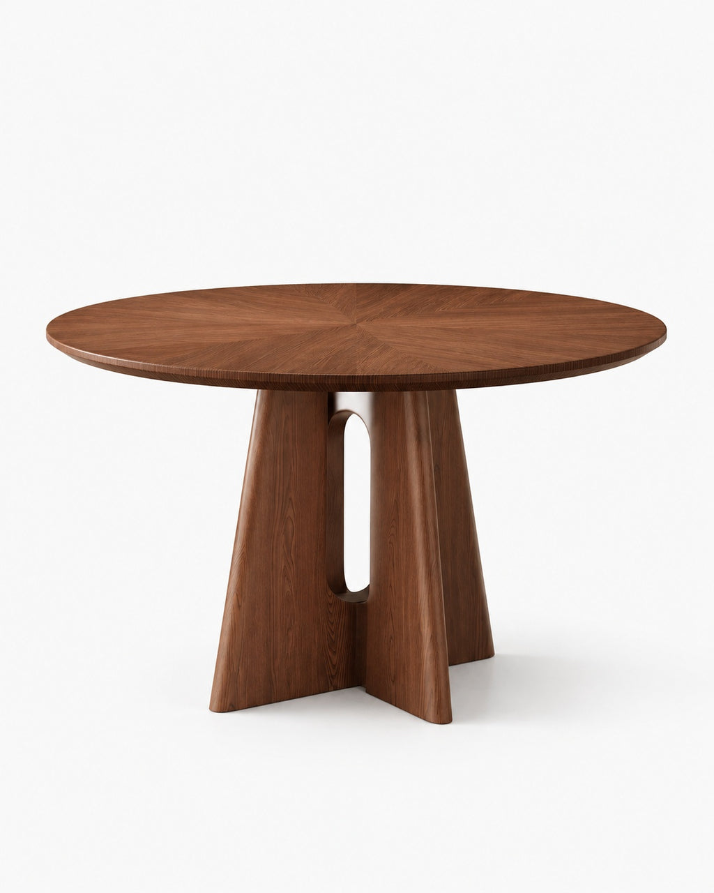 A round wooden dining table with a rich medium-brown finish, featuring a unique sculptural base with a central cutout, shown on a clean white background.