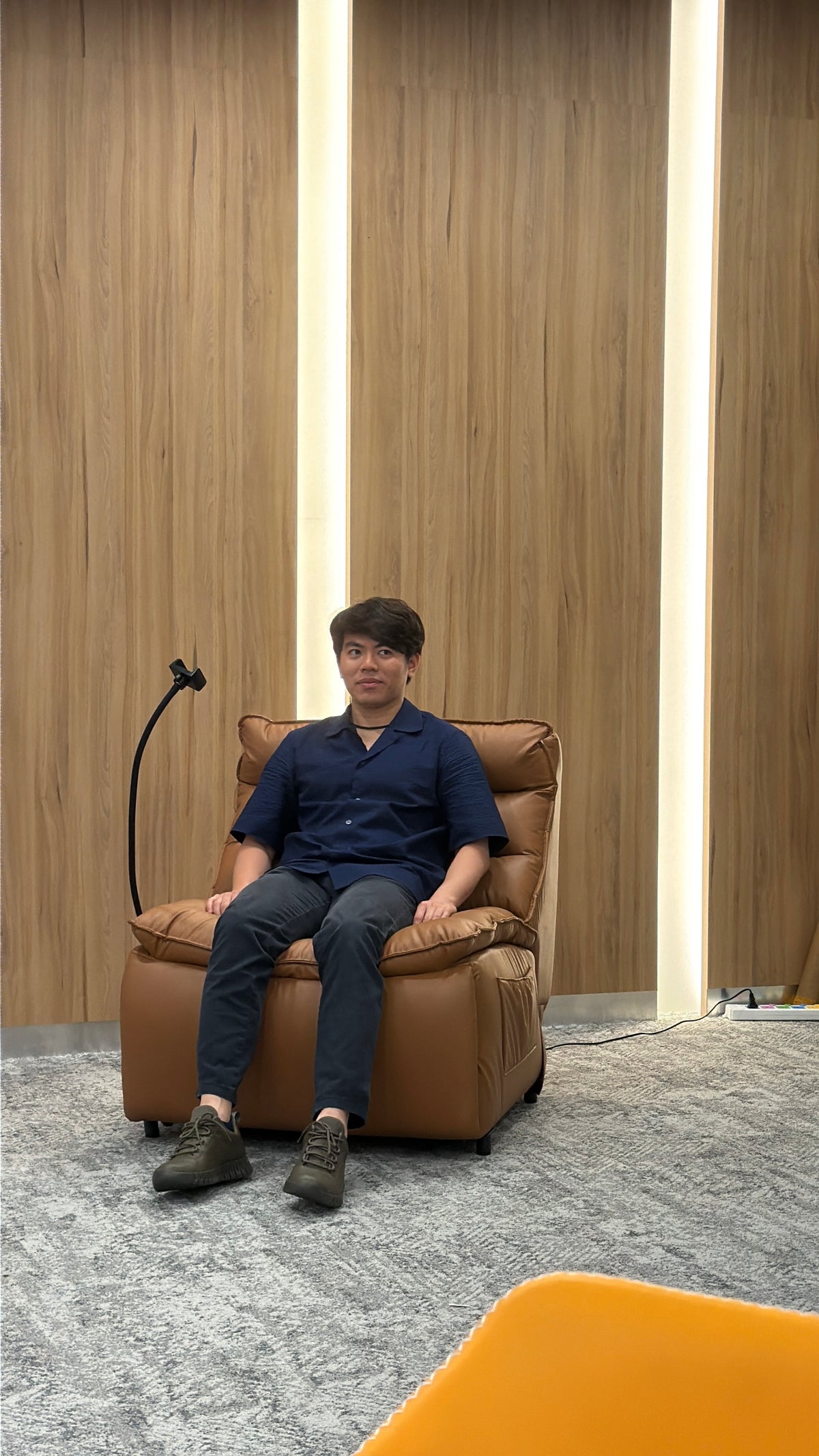 Customer seated comfortably in the CareNest recliner