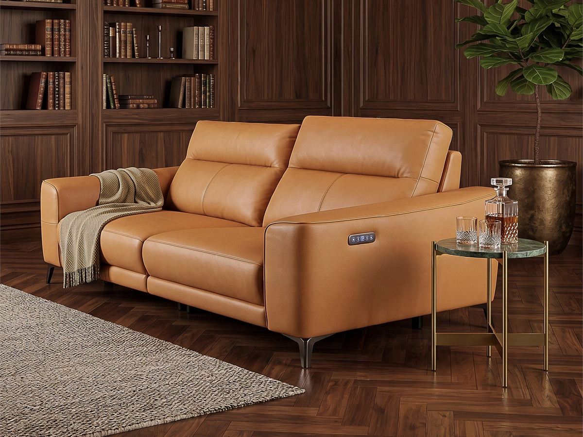 Bronze Evermore reclining sofa in a dark wood library