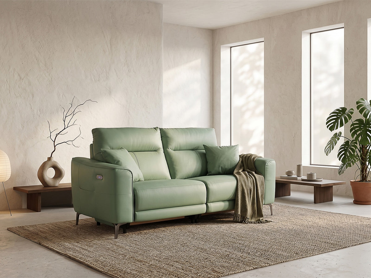 Green Evermore double reclining sofa in a light living room