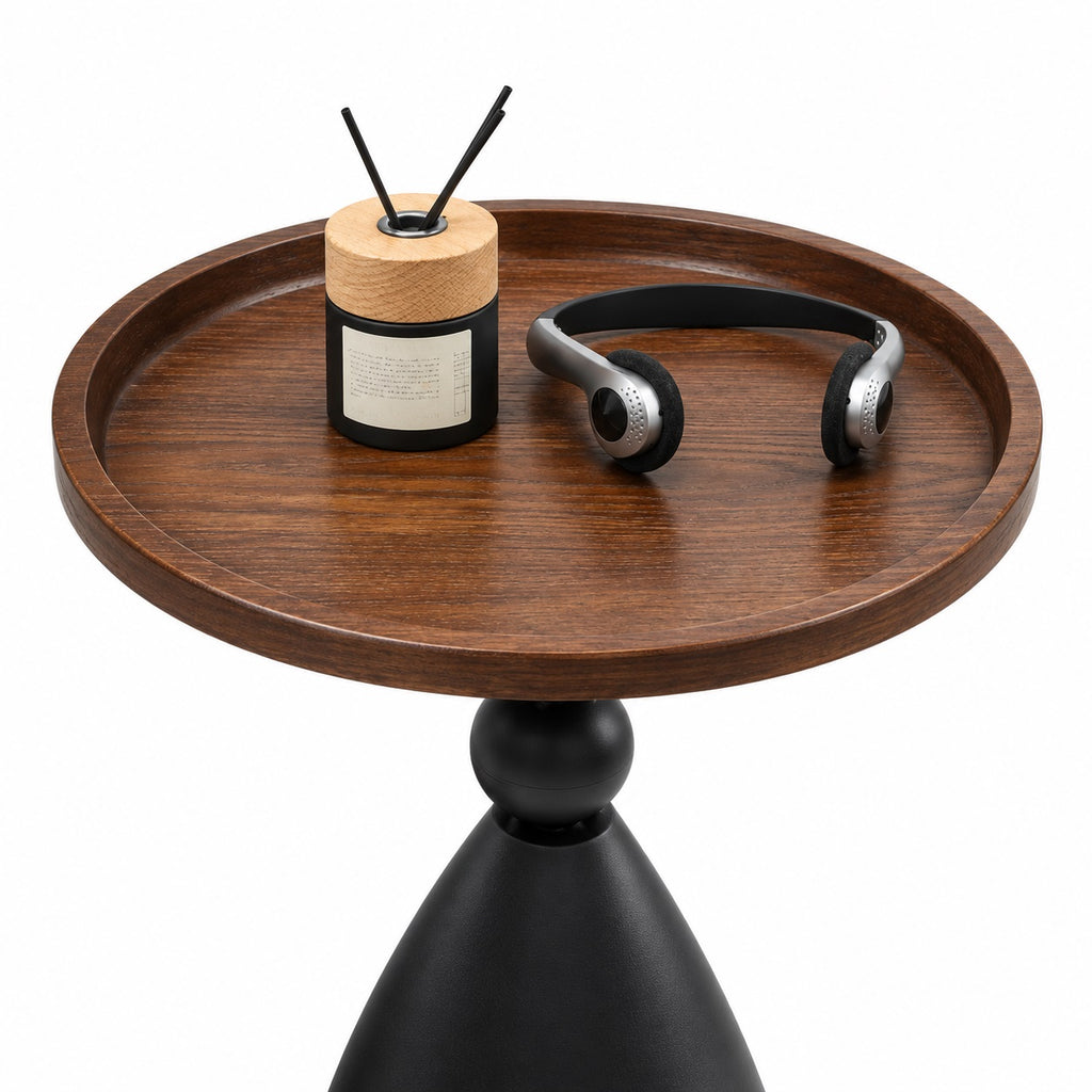 Recessed walnut pedestal side table with diffuser and headphones on pure white background